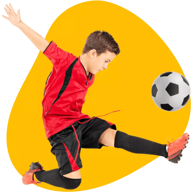 A child playing football at his football activity club