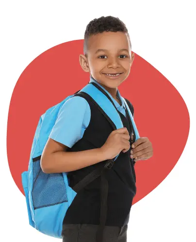 Smiling child With blue rucksack