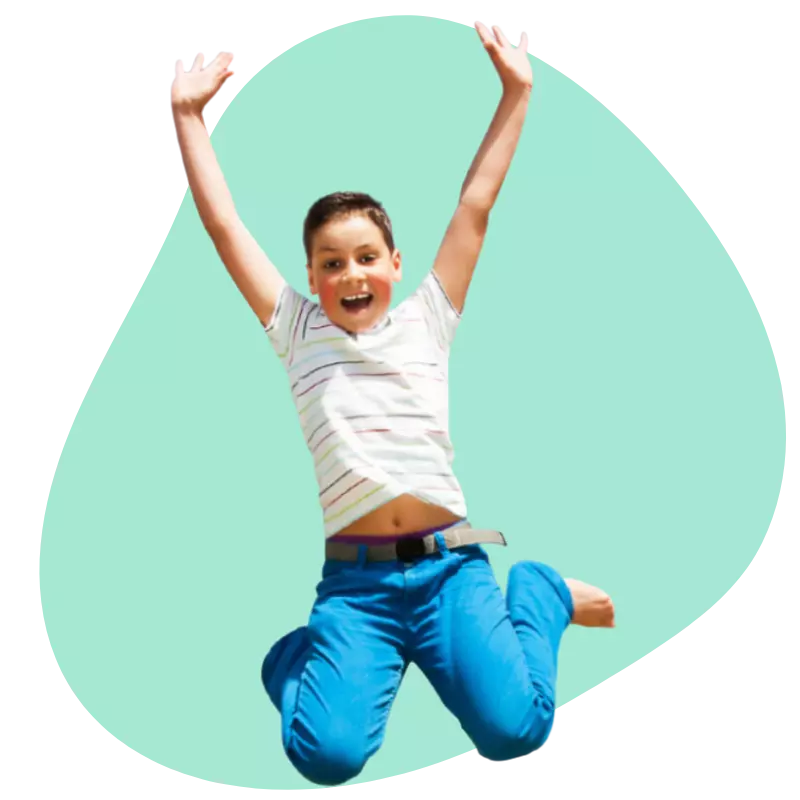 A child enjoying holiday club and jumping in the air’